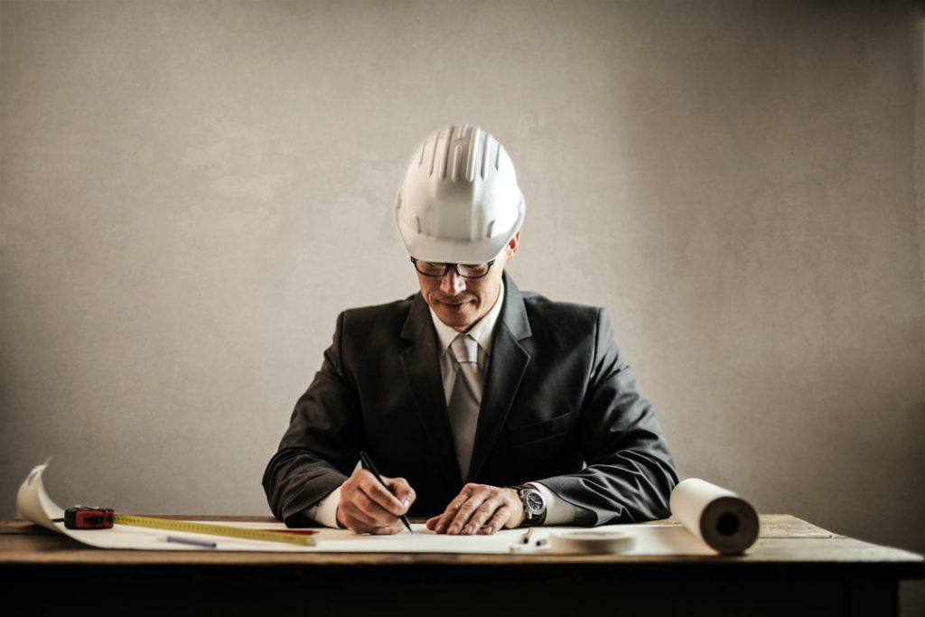 man in a suit with a helmet